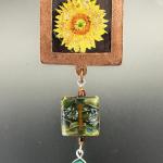 SUNFLOWER PENDANT
copper square
turquoise and dichroic glass
89.00